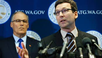 US judge temporarily blocks Trump's travel ban nationwide