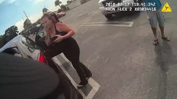 Florida woman realizes she left child in hot car in dramatic police video