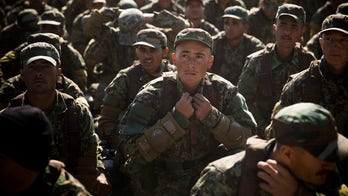 Afghan soldiers still can't read, despite $200M US-backed program, report finds