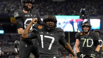 West Point cadet who said star quarterback raped her drops out