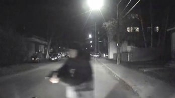 Police seek suspect who shot Alaska police officer multiple times