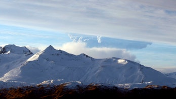 Alaska volcano erupts; ash trace reaches city