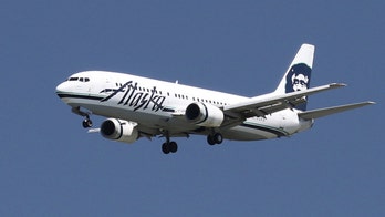 Alaska Airlines blames odor that forced plane to land on 'someone or something' in the cabin