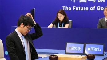 Google's AlphaGo AI beats human Go champion