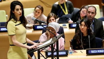 Headlines over Amal Clooney 'baby bump' earn backlash