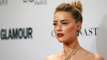 Amber Heard on being told that coming out as bisexual would 'without a doubt' end her career