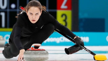 Russian curler who fell at Olympics 'looks like Angelina Jolie at 21'