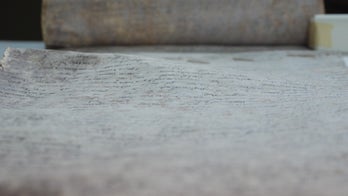 Secret Vatican manuscript's mysterious purple spots decoded
