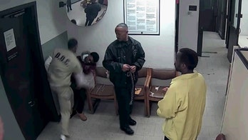 Video shows Chicago girl's accused killer beaten in courthouse lockup