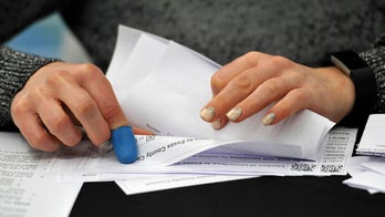 UK local elections: Conservatives score big gains, huge win for PM May