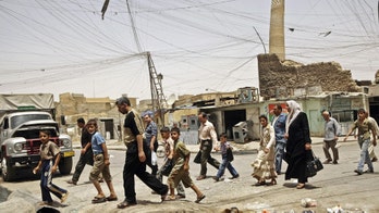 In Iraq, ISIS seals off area around symbolic mosque in Mosul