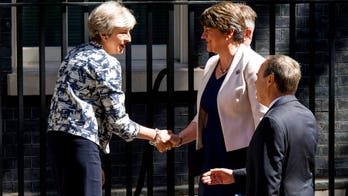 UK Conservatives, Northern Ireland party strike deal to back PM May