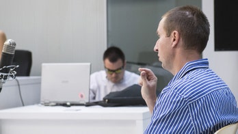 Russian hacker thought to be spam kingpin extradited to US