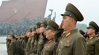 North Koreans celebrate holiday with familiar routines