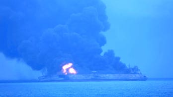 US Navy plane joins hunt for 32 sailors after Iranian tanker collides with freighter off China