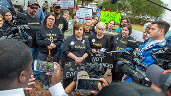 Crowd rallies for Louisiana teacher after her removal from board meeting