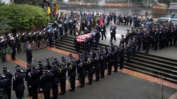 Slain Washington state deputy honored at memorial service