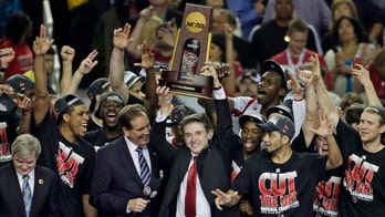 Louisville to vacate 2013 basketball title as sex scandal punishment
