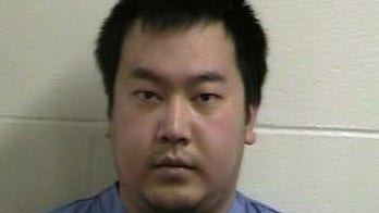 Man used hunting knife in brutal slaying at Massachusetts library, authorities say