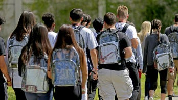 Stoneman Douglas students return to class carrying mandatory clear backpacks