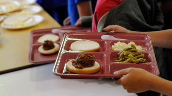 Banners with veggie superheroes encourage school salad bar use