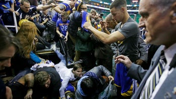 NBA star Stephen Curry's fans fall from stands trying to snag autograph