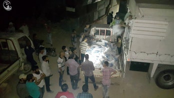 After siege, first food aid reaches Syria's war-torn Daraya -- 4 years later