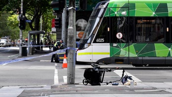 Murder charges filed against driver accused of plowing car into crowd in Australia