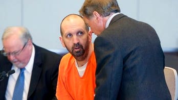 Suspect in Muslim college students' killings faces victims' relatives in court