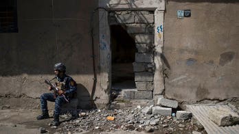 Baghdad bombing targeting police kills 15, Iraqi officials say