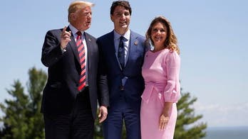 Trump blasts 'Fake News Media' for G7 reporting, posts photos of smiling at summit
