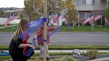 Utah officer struck by stolen car, killed, is remembered as a loyal cop