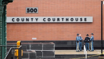 Courthouse gunman's son, daughter sentenced to prison for cyberstalking