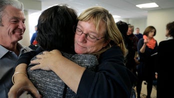 Priest accused of abuse at Rhode Island prep school in 1970s suspended