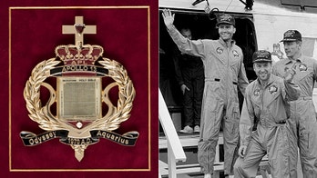 Astronauts' faith: Tiny Apollo 13 Bible up for auction