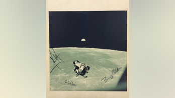 Moon landing photo signed by Apollo 11 astronauts up for auction