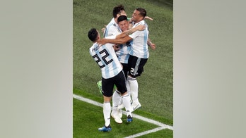 Argentina stun Nigeria 2-1 to rescue World Cup campaign