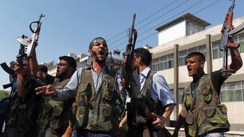 Senate Authorizes Obama to Arm Syrian Rebels