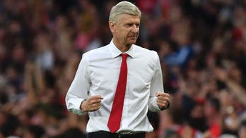 Arsene Wenger says he's 'committed' to staying at Arsenal and the FA Cup proves it