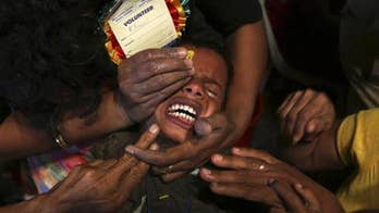 Thousands swallow sardines with herbal paste to cure asthma