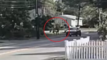 Massachusetts jogger fights off would-be kidnapper in surveillance footage