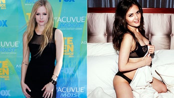 Avril Lavigne gets cozy with 'Wonder Years' star Danica McKellar in new video