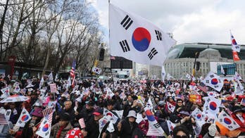 SKorean supporters of arrested ex-president protest in Seoul