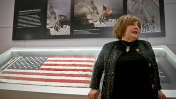 Flag firefighters raised at ground zero returns to site