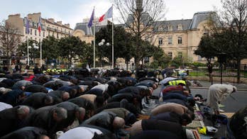 Muslims protest with street prayer in Paris suburb