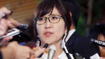 Japan PM picks revisionist as defense chief in new Cabinet