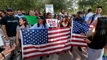 The Latest: Washington AG plans immigration suit 'very soon'