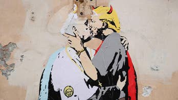 Poster of pope and 'devilish' Trump kissing appears in Rome