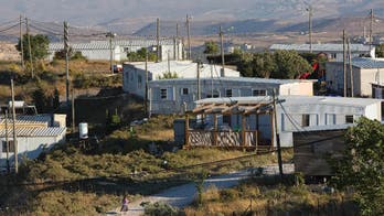 Israeli parliament gives preliminary OK to settlement bill