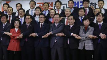 South Korean ruling party splits over impeached president